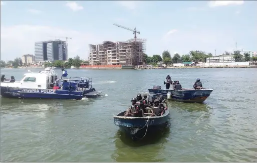  ??  ?? Some of the marine police patrol gunboats used in the operation