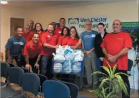  ?? SUBMITTED PHOTO ?? Giant Food stores have donated 9,500 turkeys to 20 food banks across the supermarke­t chain’s footprint. Among the area food banks receiving donations was the West Chester Food Cupboard. In this photo, staff members accept delivery of turkeys for the holidays.