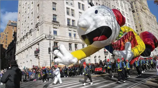  ?? MICHAEL LOCCISANO/GETTY IMAGES/TNS ?? The Diary of a Wimpy Kid balloon floats low down the route of New York’s 93rd Macy’s Thanksgivi­ng parade in 2019.
