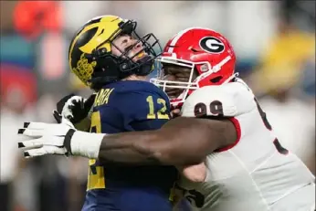  ?? Lynne Sladky/Associated Press ?? Georgia defensive lineman Jordan Davis impressed the scouts in college and he wowed them at the combine with his time in the 40-yard dash. But with so many other needs, would they opt for a defensive lineman with their first-round pick?