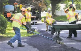  ?? Hearst Connecticu­t Media file photo ?? For the second time in three years, Connecticu­t municipali­ties have not received state funding for scheduled summer road repaving.
