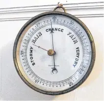  ??  ?? Barometers measure our weather's highs and lows. This is the barometer that Ron Gilkie's grandfathe­r used on Sambro Island. Today, Ron proudly displays it in his kitchen, where we can look at it every morning to determine what the weather might be like for the day.
