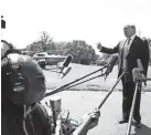  ?? ANDREW HARNIK/AP ?? President Trump prepares to board Marine One Tuesday.