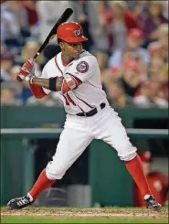  ??  ?? Washington’s Victor Robles bats during the seventh inning against Philadelph­ia, Thursday in Washington. It was Robles’ major league debut. He was called up because Brian Goodwin suffered a setback in his recovery from a groin injury.