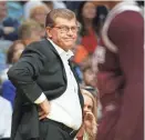  ?? TOM FOX / THE DALLAS MORNING NEWS VIA AP ?? Connecticu­t coach Geno Auriemma reacts to his teams poor start against Mississipp­i State in the first half Friday night in the semifinals of the women's Final Four in Dallas.