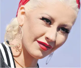  ?? TRIBUNE NEWS SERVICE ?? Christina Aguilera says she feels like “a brand new artist” with the release of Liberation, which hit No. 6 on the Billboard 200 when it came out last month.