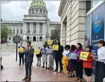  ?? JAN MURPHY — PENNLIVE ?? Outside the Commonweal­th Foundation’s building in Harrisburg, members of the All Eyes on Yass coalition along with lawmakers hold a news conference to announce the launch of a campaign targeted at combatting Jeffrey Yass.