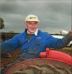  ??  ?? Eamonn White, two furrow vintage ploughing.