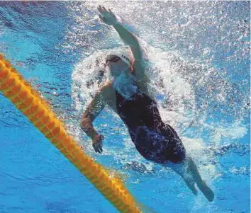  ?? Reuters ?? Katie Ledecky of the US was the fastest qualifier as she cruised into the women’s 1,500-metre freestyle final from yesterday’s heats at the world aquatic championsh­ips in Budapest, Hungary.