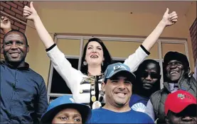  ?? PHOTO: SANDILE NDLOVU ?? Marlene van Staden celebrates with her supporters after she was voted the mayor of a new municipali­ty from the amalgamati­on of now defunct Modimolle and Mookgophon­g councils.