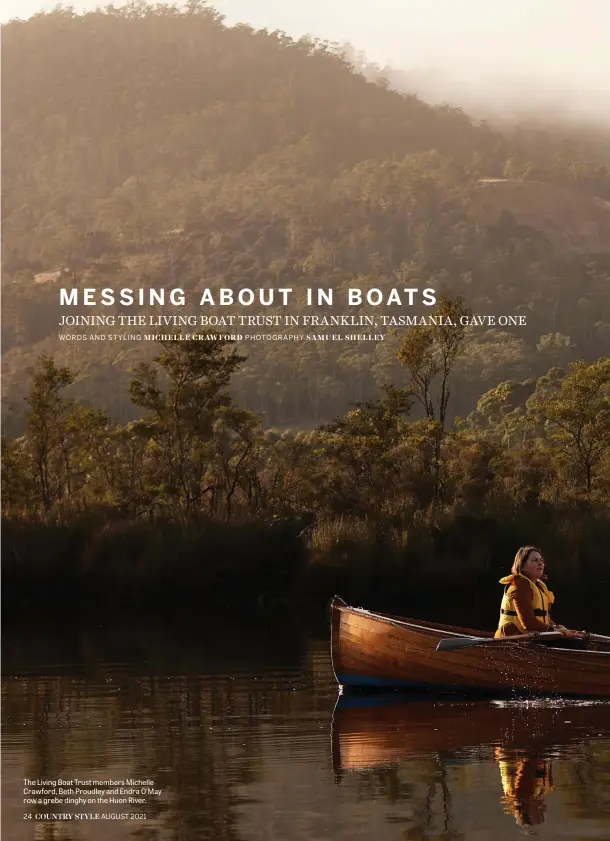  ??  ?? The Living Boat Trust members Michelle Crawford, Beth Proudley and Endra O’may row a grebe dinghy on the Huon River.