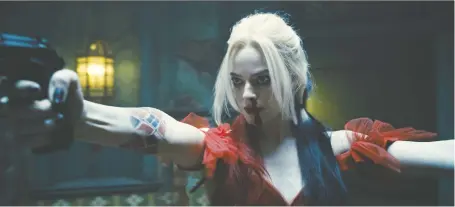  ?? WARNER BROS. PICTURES ?? Margot Robbie is reprising her role as manic comic book supervilla­in Harley Quinn for a different director in the upcoming movie The Suicide Squad. “It's funny, very funny, and action packed,” the award-winning actress says. “But it's got a lot of heart, too.”