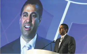  ?? Ethan Miller / Getty Images ?? FCC Chairman Ajit Pai speaks during the electronic media show in Las Vegas. Pai is pushing to roll back consumer protection­s and privacy regulation­s and put an end to net neutrality.