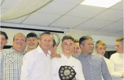  ??  ?? ARJFL U16 player Cian Cable receives his POY & PPOY award from Howard John, Michael Warren and Andrew Stevenson