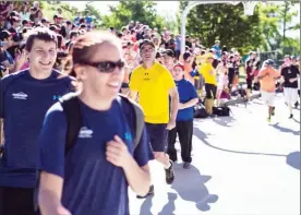  ?? Special to The Daily Courier ?? Special Olympic athletes from 2017 Motionball Marathon of Sport event run during opening ceremonies. This local fundraiser for Special Olympics includes a day of social, inclusive sports where everyone is a part of the team no matter the background,...