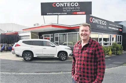  ?? PHOTO: LINDA ROBERTSON ?? Finding a niche . . . Contego Systems founder Justin McEntyre outside the firm’s premises in French St, Dunedin.