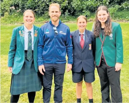  ?? ?? Charlotte Caudle, second from right, with Kane Williamson.