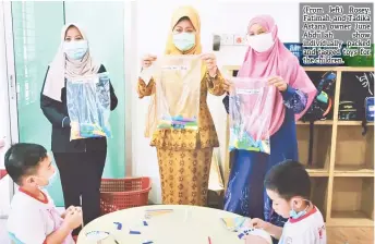  ??  ?? (From le ) Rosey, Fatimah, and Tadika Astana owner June Abdullah show individual­ly packed and tagged toys for the children.