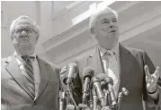  ?? Associated Press file ?? Sen. Christophe­r Dodd, D-Conn., right, and Rep. Barney Frank, D-Mass., speak in 2010 about their financial reform law, known as Dodd-Frank.