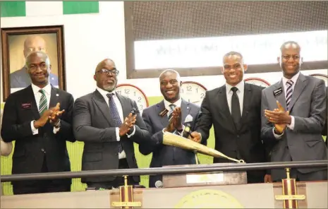  ??  ?? L-R: Head, Corporate Services Division of The Nigerian Stock Exchange (NSE), Mr. Bola Adeeko; President Nigeria Football Federation (NFF), Mr. Amaju Melvin Pinnick; Chief Executive Officer, NSE, Mr. Oscar N. Onyema; Head Coach of the Super Eagles, Mr....