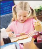  ?? — ISTOCK ?? Foster healthier eating habits by teaching younger children how to make simple snacks.