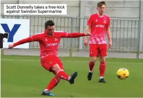  ??  ?? Scott Donnelly takes a free-kick against Swindon Supermarin­e