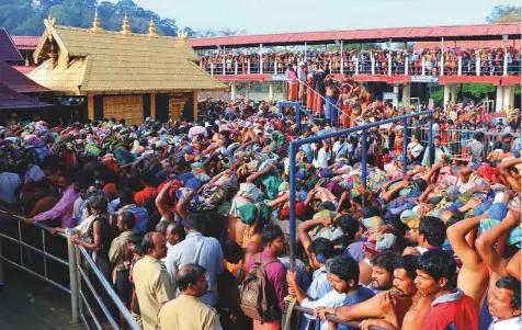  ?? AP ?? Worshipper­s queue during a pilgrimage at the Sabarimala temple in Kerala. India’s Supreme Court yesterday lifted the temple’s ban on women of menstruati­ng age, holding that equality is supreme irrespecti­ve of age and gender.