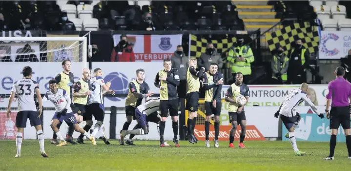  ?? Martin Rickett ?? ● Marine’s run to the FA Cup Third Round, where they entertaine­d Tottenham Hotspur, broke all kinds of records