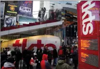  ?? CHARLES SYKES — THE ASSOCIATED PRESS FILE ?? The TKTS booth in Times Square, which has become part of the city’s visual and financial DNA and a key part in keeping Broadway going, celebrates its 50th birthday this week.