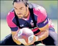  ?? Getty Images ?? MOONLIGHTI­NG: The Patriots’ Nate Ebner practices with the U.S. rugby team.