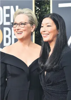  ??  ?? UNITY. Actress Meryl Streep, left, and National Domestic Workers Alliance director Ai-jen Poo at the Golden Globes.