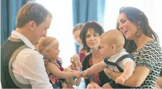  ??  ?? David Alve and daughter Eden meet the Duchess of Cambridge and Prince George in 2014.