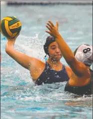  ?? DAVID WITTE/NEWS-SENTINEL ?? Tokay's Nicole Iturraran takes a shot past St. Mary's Norma Minott (8) during Tokay's 18-5 victory on Wednesday at the Tigers’ pool.