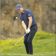  ?? Marcio Jose Sanchez / Associated Press ?? Justin Rose hits on the eighth hole during Friday’s second round of the U.S. Open in Pebble Beach, Calif.