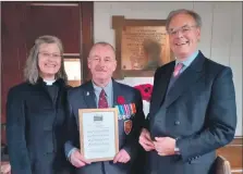  ?? ?? From left, former Kilberry minister Reverend Jane Taylor, RN veteran Aggie Dennis and Kilberry 1821 trustee Duncan Byatt with Pipe Major Hunt’s original score.