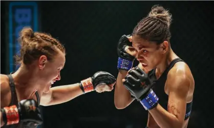  ?? ?? Fight club … Valentina Shevchenko, left, and Halle Berry in Bruised. Photograph: John Baer/Netflix © 2021