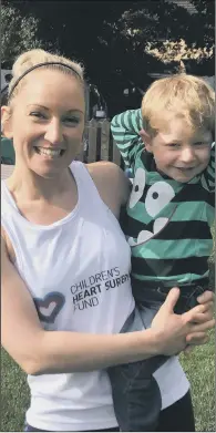  ??  ?? Marie Lees, pictured with son Ben, who was born with a congenital heart defect and underwent surgery.