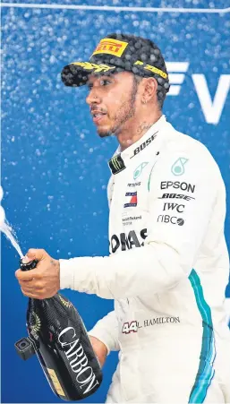  ?? Picture: Getty Images. ?? Lewis Hamilton celebrates his weekend win at the Russian Grand Prix.