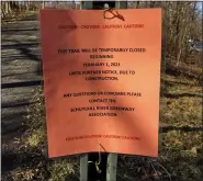  ?? SREILLY ?? A sign posted on the Schuylkill River Trail in Union Township reads: “Caution, This trail will be temporaril­y closed beginning February 1, 2020, until further notice due to constructi­on. Any questions or concerns please contact the Shuylkill River Greenway Associatio­n.” A long-awaited pedestrian bridge will be constructe­d over Route 724.