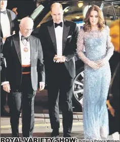  ??  ?? Britain’s Prince William (centre) and Catherine, Duchess of Cambridge, attend the Royal Variety Performanc­e at the Palladium Theatre, in London, Britain on Friday. — Reuters photo