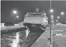  ?? PANAMA CANAL AUTHORITY ?? Holland America’s MS Zaandam passes through the Panama Canal.