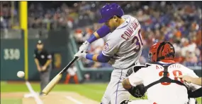  ?? Matt Slocum / Associated Press ?? The Mets’ Michael Conforto hits a two-run home run during the ninth inning on Friday.