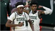  ?? CARLOS OSORIO — THE ASSOCIATED PRESS ?? Michigan State forward Gabe Brown (44) and guard Rocket Watts (2) react after a play during the first half of Friday’s game against Detroit Mercy in East Lansing.