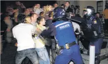  ??  ?? Castle Street clashes
. . . Revellers clash with police following the Undie 500 in 2008.