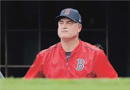  ?? ASSOCIATED PRESS FILE PHOTO ?? In this Oct. 8, 2017, photo, Red Sox manager John Farrell watches from the dugout during Game 3 against the Houston Astros in Boston.