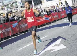  ?? TIM KROCHAK ■ THE CHRONICLE HERALD ?? Dennis Mbelenzi, who the men's full marathon at the 2021 Blue Nose Marathon in November, will not be back this weekend to defend his victory. About 6,000 participan­ts have registered for the weekend’s events.