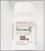  ?? Matthew Brown / Hearst CT Media The prescripti­on opioid OxyContin is Stamford-based Purdue Pharma’s top-selling drug. ??