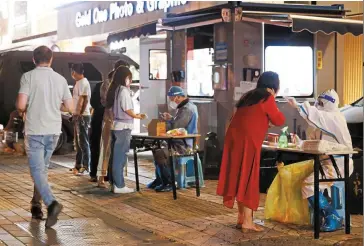  ?? ?? Tough stance: A woman gets checked for the coronaviru­s in Beijing. The European Chamber of Commerce says China’s handling of Covid-19 is hurting the country’s standing as an investment destinatio­n. — Reuters