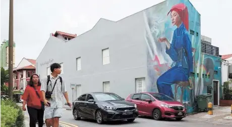  ?? Straits Times ?? Singaporea­n mural artist Yip Yew Chong called for more relaxation of censorship rules.