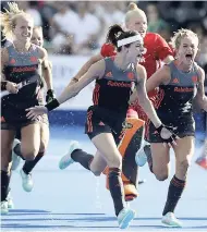  ?? AP PHOTOS ?? Netherland­s players celebrate winning a shootout during the semifinal match between The Netherland­s and Australia in the Women’s Hockey World Cup at the Lee Valley Hockey and Tennis Centre in London, yesterday.
